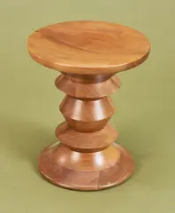 STOOL by Charles and Ray Eames, Curved, solid walnut, sold Jul 2019