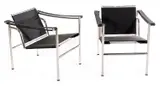 Le Corbusier, AND CHARLOTTE PERRIAND PAIR OF LC1 OUTDOOR CHAIRS, Polished stainless steel, polyester yarn, pvc coated