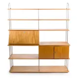 Charles and Ray Eames, STORAGE UNIT, Oak and metal frame with sectional shelving