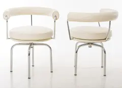 Le Corbusier, AND CHARLOTTE PERRIAND PAIR OF LC7 CHAIRS FOR CASSINA