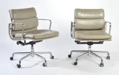 Pair of Soft Pad series Model EA435 chairs by Charles and Ray Eames, Grey leather and aluminium, sold Dec 2015