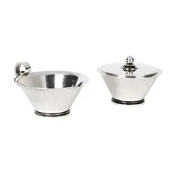 'PYRAMID' MILK JUG AND SUGAR BOWL & COVER by Harald Nielsen, each stamped manufacturer's mark, DESSIN / HN / DENMARK / STERLING / 925S / 600B, sold May 2026