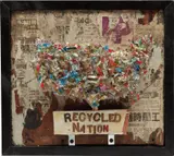 Greg Haberny, Recycled Nation, 2010, found newspaper, recycled plastic, glitter, glue, metal brackets, screws and gold letters on wood, in artist's frame