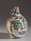 Pablo Picasso, Laughing-eyed face (Visage aux yeux rieurs), 1969, White earthenware turned pitcher with knife engraving, painted in colors with partial brushed glaze