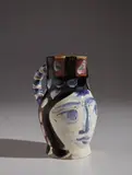 Painted face (Tête peinte) by Pablo Picasso, 1953, White earthenware turned pitcher, painted in colors with partial brushed glaze; ceramic, Madoura edition, sold Apr 2018