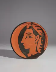 Jacqueline's profile (Profil de Jacqueline) by Pablo Picasso, 1962, Red earthenware round plate, painted in black with partial brushed glaze; ceramic, Madoura edition, sold Apr 2018