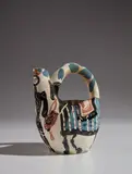 Pablo Picasso, Rider and Horse (Cavalier et cheval), 1952, White earthenware turned pitcher, painted in colors, with knife engraving and partial brushed glaze