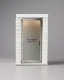 Maurizio Cattelan, The 1:6 Scale Wrong Gallery, 2006, Multiple comprising wood, brass, steel, aluminum, resin, plastic, glass and electric lighting, with accompanying copy of the Wrong Gallery Times, all contained in the original cardboard box