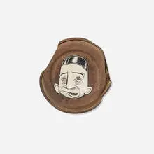 Barry McGee, Untitled, paint on rusted paint can lid