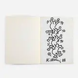 Keith Haring, Untitled (Totem Drawing on Exhibition Catalog), 1988, marker on paper in bound book