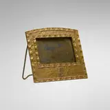 Tiffany Studios, Heraldic Pattern calendar frame, c. 1910, gilt bronze