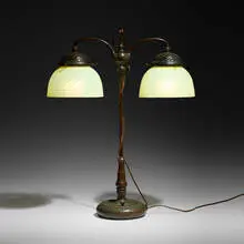 Tiffany Studios, Double student lamp, c. 1910, patinated bronze, hand-blown uranium Favrile glass