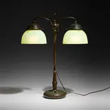 Tiffany Studios, Double student lamp, c. 1910, patinated bronze, hand-blown uranium Favrile glass