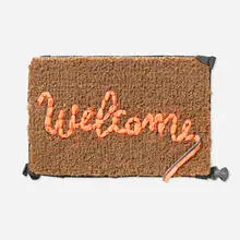 Banksy, Welcome Mat, 2020, life vest fabric hand-stitched on mat