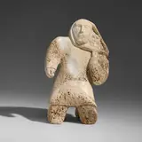 Inuit, Figure with two faces, whale bone