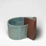 Ken Eastman, Architectural vessel, 1989, Stoneware, of high sided undulating form, decorated in brown and blue slips