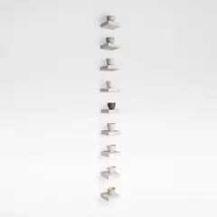 Julian Stair, Nine cups on shelves, Porcelain, decorated in matte glazes of black, grey and white, each on an individual square plaster composite ground