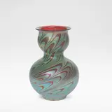Loetz, 'Rubin Phaenomen', vase, circa 1898, Phänomen Gre 7624, ruby glass, decorated iridescence drawn to a point and spiralling upwards