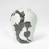 Jo Hahn Locher, for Bing & Grondahl, circa 1915, Porcelain, decorated in high relief with motifs of sea weed, partially decorated in a black crystalline glaze accented with silver inlays