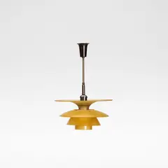 for Louis Poulsen by Poul Henningsen, circa 1935, Patinated brass, yellow frosted glass and Bakelite, sold Jun 2026