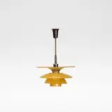 Poul Henningsen, for Louis Poulsen, circa 1935, Patinated brass, yellow frosted glass and Bakelite