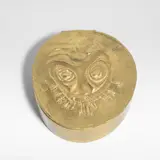 Line Vautrin, 'Le lion' boîte, circa 1950, Gilt-bronze, cork to interior, lid modelled with an abstract lion's face with arrows