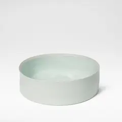Large low cylinder by Edmund de Waal, circa 2000, Porcelain, pale blue celadon glaze, sold Jun 2026