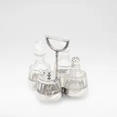 Christopher Dresser, for Hukin & Heath, 1879, Electroplated metal, facet-cut glass, comprising