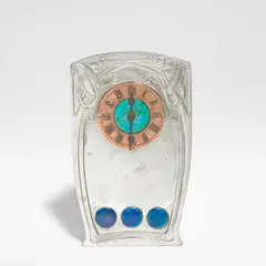 Archibald Knox, Tudric clock, model no. 0369, circa 1905, Pewter, copper and enamel, the copper chapter ring with raised Roman numerals