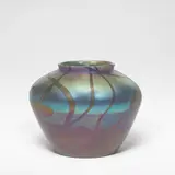 'Leaf and Vine' vase by Tiffany Studios, circa 1905, Iridescent and red glass, sold Mar 2026