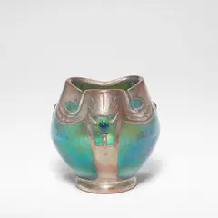'Papillon' vase by Loetz, circa 1900, Blown glass with speckled iridescence, of globular form with a pinched trefoil rim, offered Mar 2026