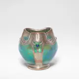 'Papillon' vase by Loetz, circa 1900, Blown glass with speckled iridescence, of globular form with a pinched trefoil rim, offered Mar 2026