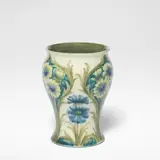 William Moorcroft, Florian Ware vase, circa 1900, Stoneware, of baluster form, decorated with motifs of daisies