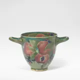 William Moorcroft, Twin-handled 'Pomegranate' vase, circa 1915, Glazed earthenware, tube-lined decoration of pomegranates amongst foliage in green, blue and red glazes