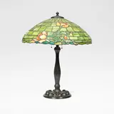 Duffner & Kimberly, Table lamp, circa 1910, Leaded glass and patinated metal, the shade with motifs of poppies or roses