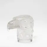 'Tete d'Aigle', car mascot, designed 1928 by René Lalique, Clear glass, frosted and polished, sold Mar 2026