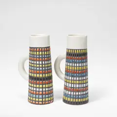 Roger Capron, Two 'Pyjama' pitchers, circa 1955, Stoneware, white and black glazes with polychrome enamelled chequerboard designs