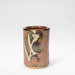Shoji Hamada, Brush pot, circa 1971, Stoneware, rich persimmon and grey glazes with brushed wax resist stem leaf decoration to two sides