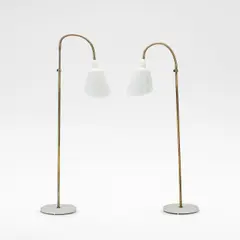 Arne Jacobsen, Two 'Bellevue' standing lamps, model no. AJ7, designed 1929, White lacquered metal, cast iron bases and brass stems