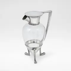 Christopher Dresser, 'Crow's Foot Decanter', model no. 2045, designed 1879, Electroplated metal and clear glass, the spout and collar joined to the base with a curved handle, raised on three crow's foot supports