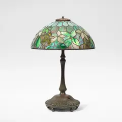 Tiffany Studios, 'Woodbine' leaded glass table lamp, circa 1905, Leaded glass and patinated bronze, the hemispherical shade raised on a ribbed base