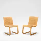 Pair of chairs, model no. 21, designed 1933 by Alvar Aalto, Karelian birch ply seats on birch bentwood supports, sold Dec 2025