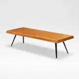 Charlotte Perriand, Coffee table, designed 1953, manufactured circa 1960, Elm and lacquered steel, the rectangular top with a bevelled edge, raised on tapering supports