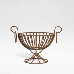André Dubreuil, Fire basket, circa 1988, Wrought and rust treated iron, the basket raised on a splayed foot