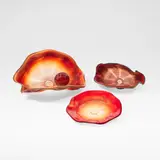 Four-piece red 'Macchia' set by Dale Chihuly, 1987, Handblown glass, spiralling striations of red, orange, and purple, offered Dec 2025