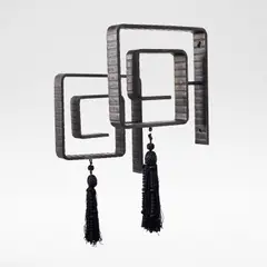 Unique pair of wall brackets by Mark Brazier-Jones, circa 1998, Patinated bronze, worked into a squared spiral shape, offered Dec 2025