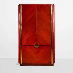 Karl Springer, Special Order 'Oval Cabinet', , mahogany, polished brass, mirrored interior