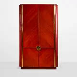 Karl Springer, Special Order 'Oval Cabinet', , mahogany, polished brass, mirrored interior