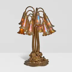 Tiffany Studios, Twelve-Light Lily Table Lamp, bronze with etched dore finish, Favrile glass, underside of base stamped 'TIFFANY STUDIOS NEW YORK 382', each shade incised 'L