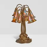 Tiffany Studios, Twelve-Light Lily Table Lamp, bronze with etched dore finish, Favrile glass, underside of base stamped 'TIFFANY STUDIOS NEW YORK 382', each shade incised 'L